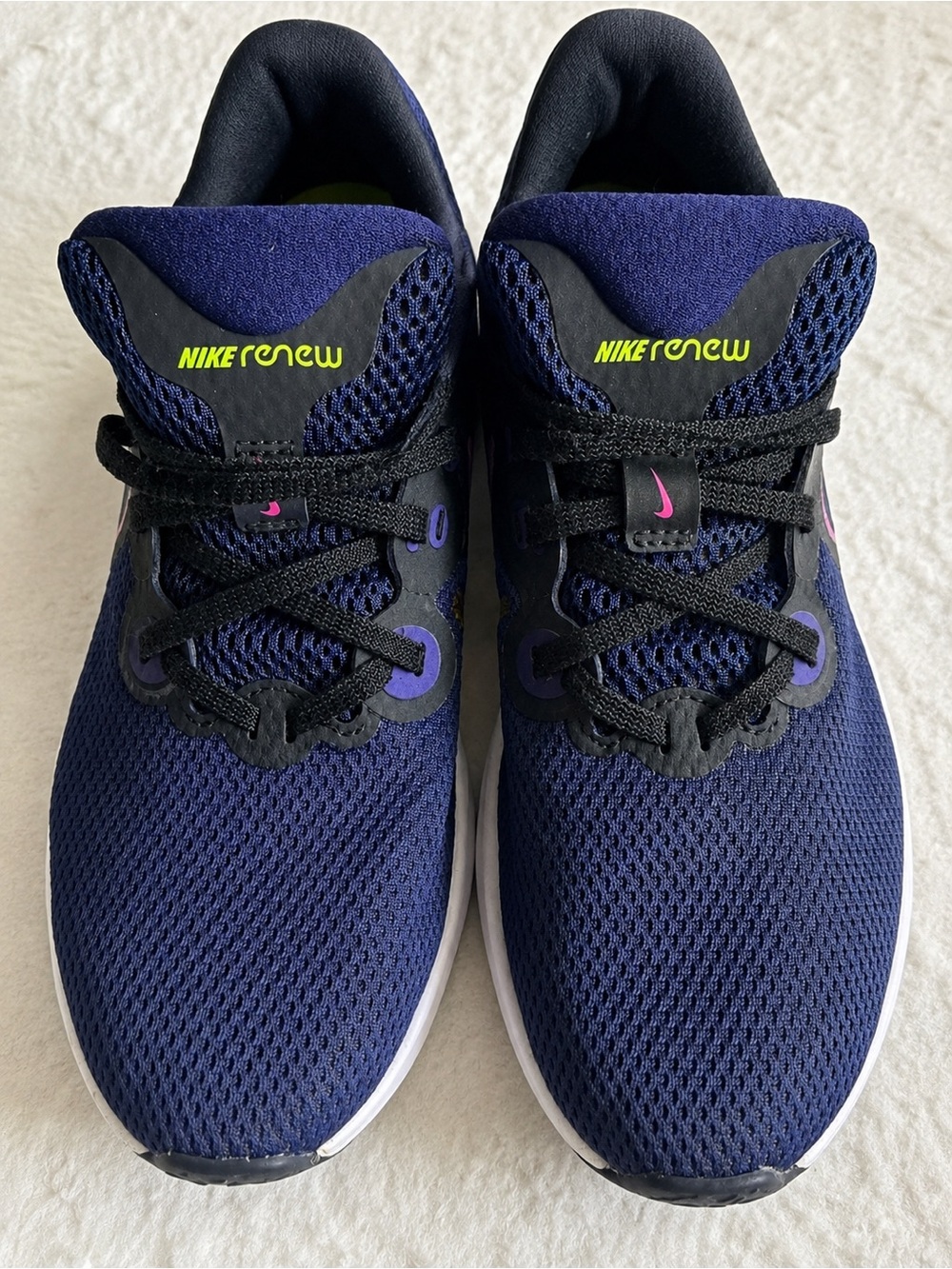 Nike women’s ' Navy Mesh Sneakers with Black and Purple Accents